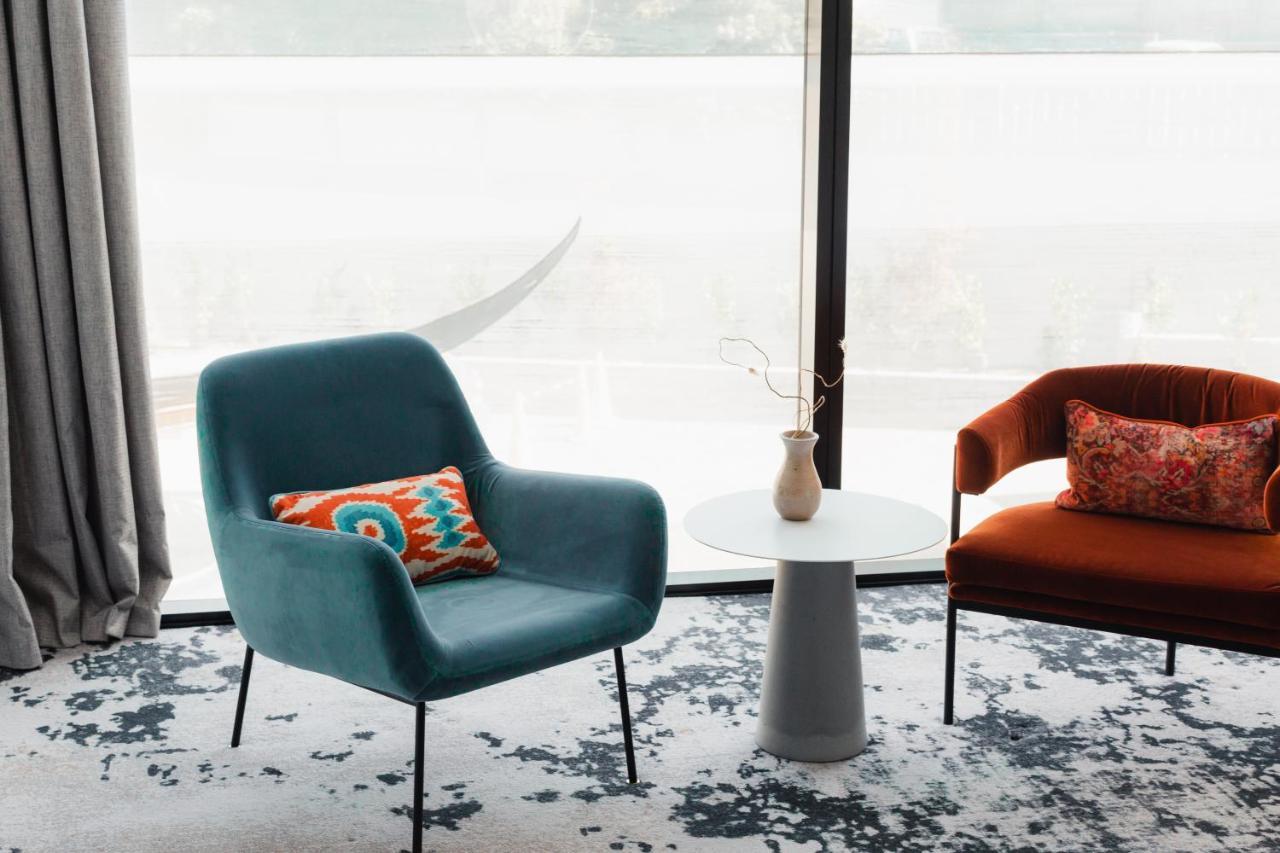Ebb-Dunedin Exterior photo The 1950s armchair, designed by Hans Wegner, is a classic example of Danish design.
