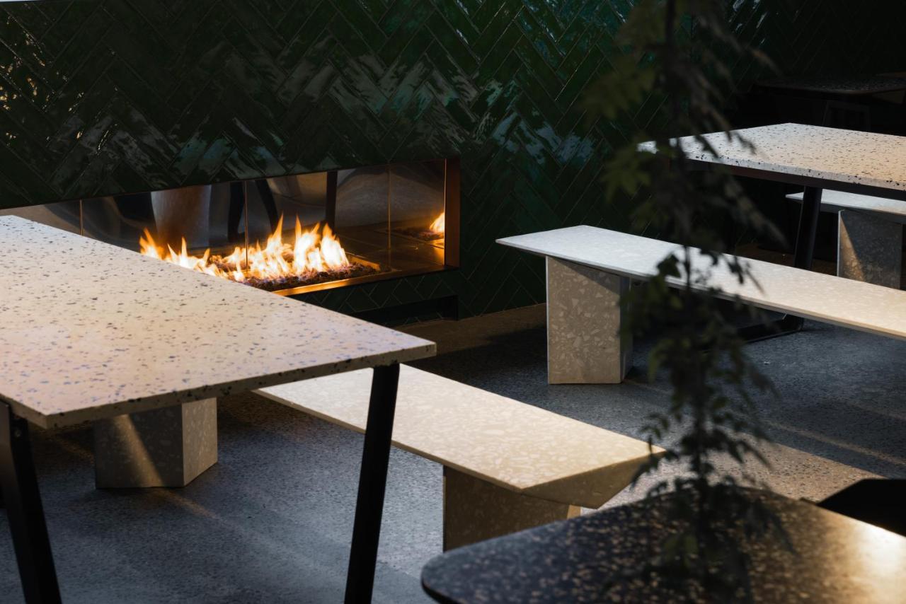 Ebb-Dunedin Exterior photo The outdoor fireplace at the restaurant